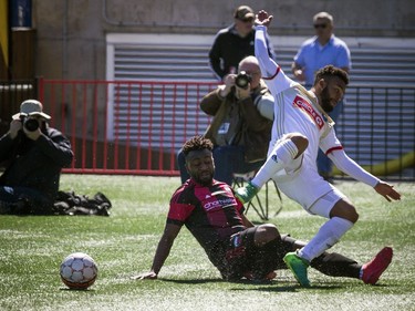 Ottawa Fury FC #6 Sergio Manesio battles North Carolina FC #27 DJ Taylor for the ball in the corner of the field during the Furry's home opener Saturday April 21, 2018 at TD Place.