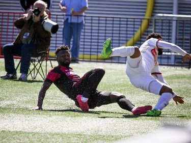 Ottawa Fury FC #6 Sergio Manesio battles North Carolina FC #27 DJ Taylor for the ball in the corner of the field during the Furry's home opener Saturday April 21, 2018 at TD Place.