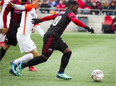 Ottawa Fury FC #30 Adonijah Reid goes for the ball in the first half of the game against Cincinnati FC Saturday April 28, 2018 at TD Place.   Ashley Fraser/Postmedia