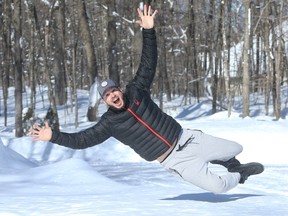 Erik Bedard never cared much for the attention that came with being a major league pitcher, but he's now relaxing, enjoying the free time retirement affords him. Above, he hams it up for the camera after plowing the driveway in February 2018.