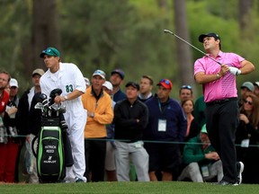 Patrick Reed of the United States plays his shot from the 17th tee during the final round of the 2018 Masters Tournament at Augusta National Golf Club on April 8, 2018 in Augusta, Georgia.