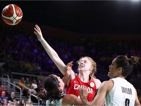 Catherine Traer of Chelsea tries to flip the ball into the basket during the bronze-medal women's basketball game of the Commonwealth Games in Australia on Saturday.