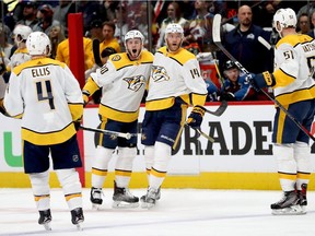 Ryan Ellis #4, Colton Sissons #10, Mattias Ekholm #14 and Austin Wilson #51 of the Nashville Predators celebrate a gaol against the Colorado Avalanche in Game Six of the Western Conference First Round during the 2018 NHL Stanley Cup Playoffs at the Pepsi Center on April 22, 2018 in Denver, Colorado.