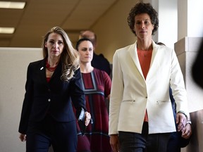 Andrea Constand (R) plaintiff for the Bill Cosby trial arrives at the Montgomery County Courthouse for the fifth day of his sexual assault retrial on April 13, 2013 in Norristown, Pennsylvania. (Corey Perrine - Pool/Getty Images)