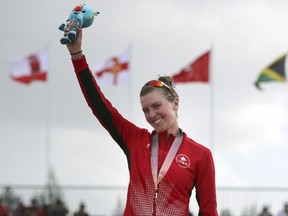 Joanna Brown of Carp celebrates after receiving her bronze medal in the women's triathlon at Southport Broadwater Parklands in the 2018 Commonwealth Games at Gold Coast, Australia, on Thursday, April 5, 2018.