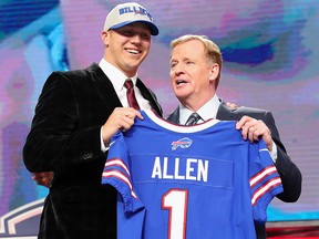 Josh Allen of Wyoming poses with NFL Commissioner Roger Goodell after being picked by the Buffalo Bills during the first round of the 2018 NFL draft at AT&T Stadium on April 26, 2018 in Arlington, Texas. (Tom Pennington/Getty Images)