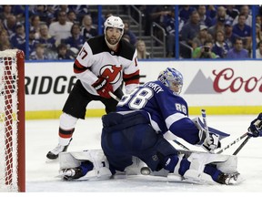 Devils left-winger Patrick Maroon watches his shot go wide of Lightning goaltender Andrei Vasilevskiy during the third period of Game 2 on 
Saturday in Tampa, Fla.
