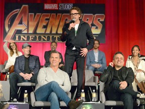 (L-R) Actor Elizabeth Olsen, President of Marvel Studios and Producer Kevin Feige, actors Josh Brolin, Mark Ruffalo, Robert Downey Jr., Tom Hiddleston, Director Joe Russo, and actors Zoe Saldana and Sebastian Stan attend the Global Press Conference at the Avengers: Infinity War Press Junket in Los Angeles, CA April 22nd, 2018 (Photo by Charley Gallay/Getty Images for Disney)