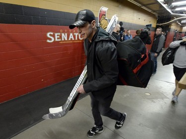 Ottawa Senators right winger Alex Burrows leaves following the team's season wrap up in Ottawa, Monday April 9, 2018.