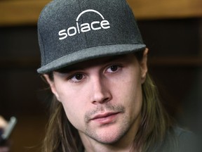 Ottawa Senators captain Erik Karlsson speaks to reporters in the locker room during the team's season wrap up in Ottawa, Monday, April 9, 2018.