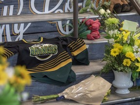 A memorial at the stairs that lead to Elgar Petersen Arena is shown in Humboldt, Sask., on Saturday, April 7, 2018.