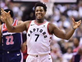 Raptors guard Kyle Lowry smiles after a basket against the Wizards during second half NBA playoff action in Toronto on Saturday, April 14, 2018. (Frank Gunn/THE CANADIAN PRESS)