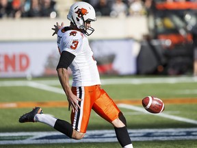 Richie Leone (3) punts the ball during the second half of CFL action between the Edmonton Eskimos and the BC Lions at Commonwealth Stadium in Edmonton, Alta.. on Saturday September 26, 2015. (Ian Kucerak/Postmedia Network)
