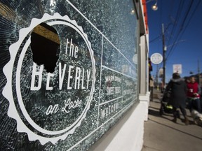 Broken glass on the Beverly after a reported act of vandalism in which many storefronts were targeted along Locke Street in Hamilton, Ont. on Sunday March 4, 2018.
