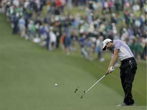 Adam Hadwin of Canada hits a shot toward the first green during the third round of the Masters on Saturday.