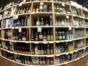This June 16, 2016 file photo made with a fisheye lens shows bottles of alcohol during a tour of a state liquor store in Salt Lake City. A large international study released on Thursday, April 12, 2018 says adults should average no more than one alcoholic drink per day, and that means many countries' alcohol consumption guidelines may be far too loose.