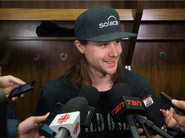 Erik Karlsson discusses his future with the media as the Ottawa Senators clear out their lockers and have their exit meetings with coaches and management at Canadian Tire Centre following the final game of the season on Saturday. Photo by Wayne Cuddington/ Postmedia