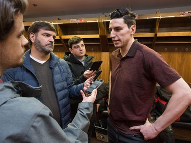 Alex Burrows talks to reporters as the Ottawa Senators clear out their lockers and have their exit meetings with coaches and management at Canadian Tire Centre following the final game of the season on Saturday. Photo by Wayne Cuddington/ Postmedia