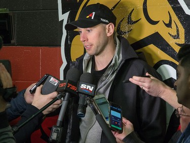 Craig Anderson searches for answers while being scrummed by the media as the Ottawa Senators clear out their lockers and have their exit meetings with coaches and management at Canadian Tire Centre following the final game of the season on Saturday. Photo by Wayne Cuddington/ Postmedia