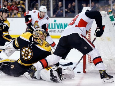 Senators winger Ryan Dzingel scores his second goal of the game against the Bruins' Anton Khudobin (35). That made the score 3-2, but the Bruins put the game away with two more on the way to a 5-2 victory.