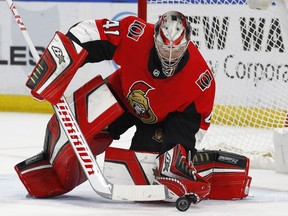 Ottawa Senators goalie Craig Anderson makes a save during the first period of the team's NHL hockey game against the Buffalo Sabres on Wednesday, April 4, 2018, in Buffalo, N.Y.