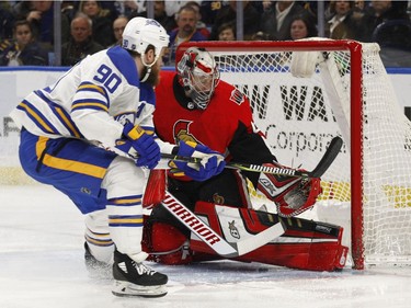 Buffalo Sabres forward Ryan O'Reilly (90) scores on Ottawa Senators goalie Craig Anderson (41) during the first period of an NHL hockey game, Wednesday, April 4, 2018, in Buffalo, N.Y.