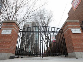 Locked gates at the entrance to the Waller Mall, a pedestrian route that runs adjacent to a luxury condo between Rideau and George Streets.