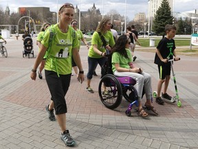 Kristy Wood-Giles arrives at City Hall as she kicks off the Ontario portion of her TransCanada Trek for Lyme in Ottawa on Saturday, May 5, 2018.