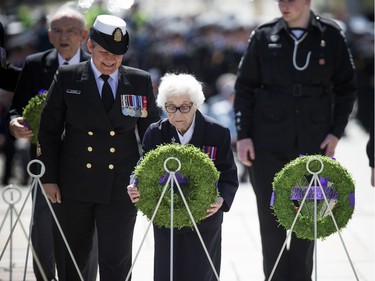 The Anniversary of the Battle of the Atlantic Ceremony to commemorate the sacrifices made by thousands of Canadians who fought in the North Atlantic took place in Ottawa Sunday May 6, 2018, at the National War Memorial. Second World War veteran Elsa Lessard laid a wreath Sunday.   Ashley Fraser/Postmedia