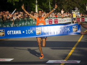 Andamlak Berta of Ethiopia, the winner of the 10K race, crosses the finish line on Saturday, May 26, 2018 at Tamarack Ottawa Race Weekend.