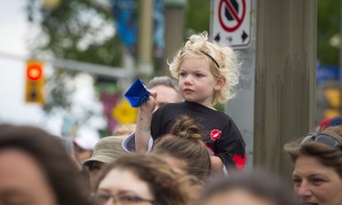 Three-year-old Abigail Maley cheers on the runners start the marathon Sunday May 27, 2018 at Ottawa Race Weekend.    Ashley Fraser/Postmedia