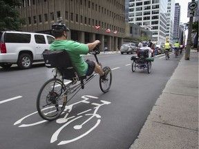 Cyclists came out in force as the City of Ottawa officially opened the segregated bike lanes on Laurier Avenue on July 10, 2011.