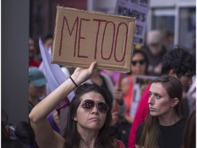 Demonstrators participate in the #MeToo march in response to several high-profile sexual harassment scandals on November 12, 2017 in Los Angeles, California.