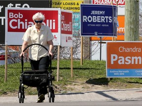 At Baseline and Merivale, incumbent Bob Chiarelli's sign competes with challengers Jeremy Roberts (PC) and Chandra Pasma (NDP). With the provincial election officially on, political signs have popped up around the city Wednesday (May 9, 2018). Julie Oliver/Postmedia 

lawn