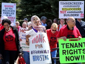 About 50 ACORN activists and residents held a demonstration at Heron and Sandalwood Drive on Thursday, May 17, 2018 demanding more time for tenants to find housing before eviction at the end of September.