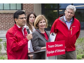 Ottawa Centre Liberal candidate Yasir Naqvi speaks as fellow candidates (L-R) Stephanie Maghnam (Kanata-Carleton), Nathalie Des Rosiers (Ottawa-Vanier), and John Fraser (Ottawa-South) listen during a press conference where Ottawa area Liberals highlighted their job creation record in the capital. May 15, 2018.