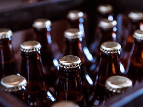 Crate with full beer bottles