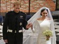 Prince Harry and Meghan Markle leave after their wedding ceremony at St. George's Chapel in Windsor Castle on Saturday, May 19, 2018.