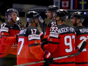 Team Canada celebrates the opening goal against South Korea during the 2018 IIHF Ice Hockey World Championship group stage game at Jyske Bank Boxen on Sunday, May 6, 2018 in Herning, Denmark.
