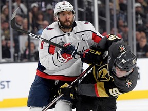 Tomas Nosek of the Vegas Golden Knights is checked by Alex Ovechkin of the Washington Capitals at T-Mobile Arena on May 30, 2018 in Las Vegas. (Harry How/Getty Images)