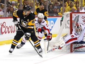 Pittsburgh’s Sidney Crosby was robbed in close by Washington’s Braden Holtby last night.  The Caps won in OT to eliminate the Penguins. (Getty Images)
