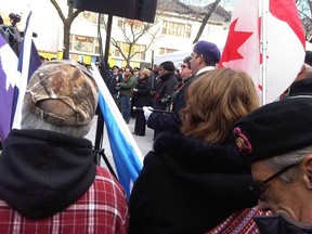 Ontario NDP Leader Andrea Horwath is captured in a photo where it appears she is distracted by her phone during a Remembrance Day event in this undated photo.