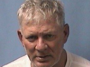 Police say former Major League Baseball star Lenny Dykstra put a gun to his New Jersey Uber driver's head when the driver declined to change the trip's destination. Dykstra was arrested early Wednesday, May 23, 2018 outside police headquarters after the driver stopped and ran out of the car. (Linden (N.J.) Police Department via AP)