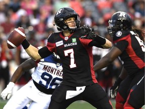 Ottawa Redblacks quarterback Trevor Harris (7) makes a pass against the Montreal Alouettes during first half pre-season CFL action in Ottawa on Thursday, May 31, 2018.