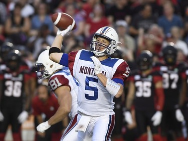 Montreal Alouettes quarterback Drew Willy (5) makes a pass against the Ottawa Redblacks during first half pre-season CFL action in Ottawa on Thursday, May 31, 2018.