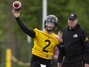 The newest addition to the CFL Hamilton Tiger Cats roster, quarterback Johnny Manziel (2) is seen with teammates on the field at McMaster University during Tiger Cats training camp in Hamilton, Ont., on Sunday, May 20, 2018. The former NFLer and Heisman Trophy winner signed a two-year deal with the Hamilton Tiger Cats to further his career after a long break.