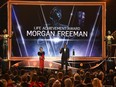 Actor Rita Moreno (L) and honouree Morgan Freeman onstage during the 24th Annual Screen Actors Guild Awards at The Shrine Auditorium on Jan. 21, 2018 in Los Angeles.