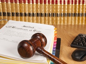judge gavel on legal document
