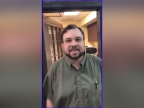 Video screenshot of an unnamed worker at the Country Inn & Suites by Radisson in Newport News, Va., who was fired after his altercation with a guest.