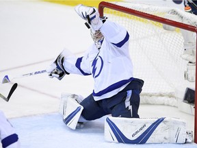 Tampa Bay Lightning goaltender Andrei Vasilevskiy, of Russia, stops the puck during the third period of Game 4 of the team's NHL hockey Eastern Conference finals against the Washington Capitals, Thursday, May 17, 2018 in Washington.